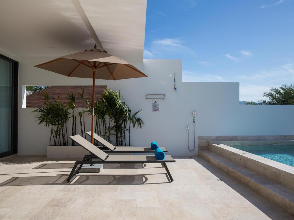 Three-Bedroom Pool Suite Seaview & Cinema
