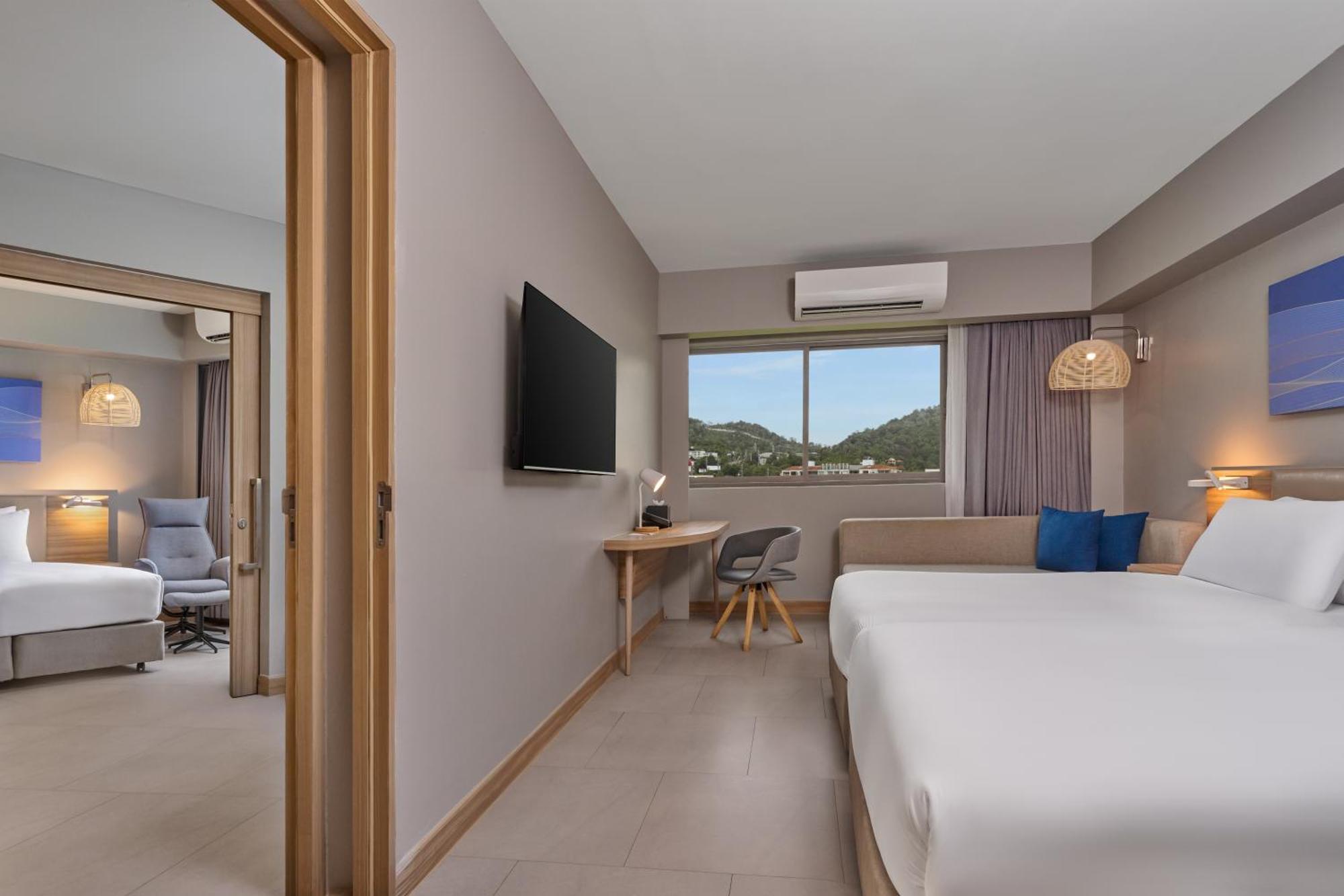 Two-Bedroom Suite One Double Two Single Beds